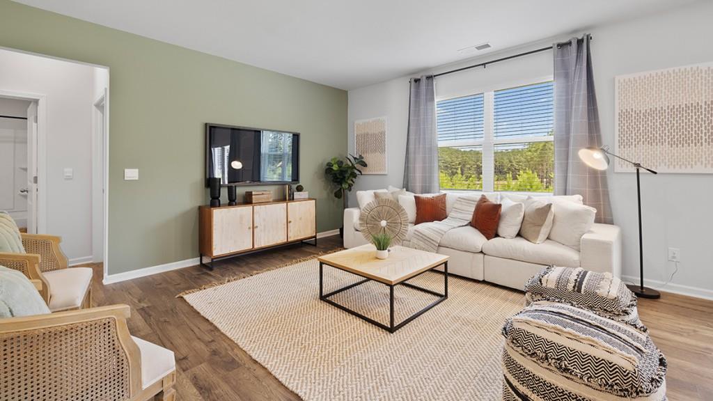 3863 Donetta Drive Atlanta, GA 30349 - Photo 11 of 64 a living room with furniture and a window
