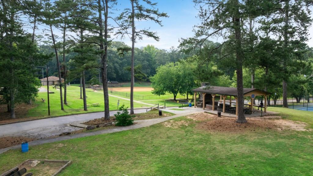 3863 Donetta Drive Atlanta, GA 30349 - Photo 55 of 64 a view of a park with swings