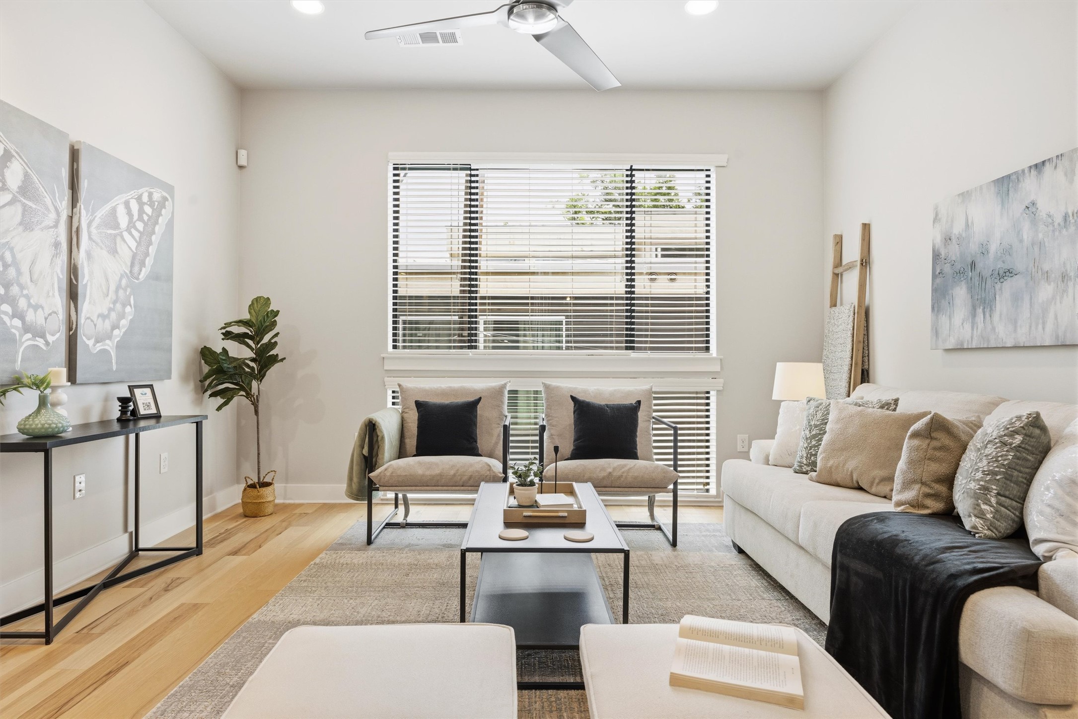 2314 Enfield Road, Unit 203 Austin, TX 78703 - Photo 12 of 37 Soaring ceilings and wide-plank hardwood floors define this bright, open living space.