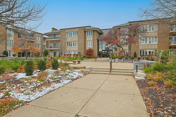 a front view of a building with street view