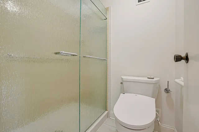 a view of a hallway with washer and dryer