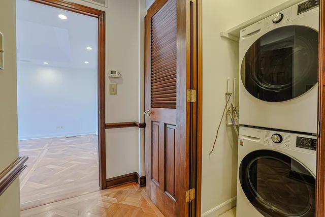 a bathroom with a bathtub and a mirror