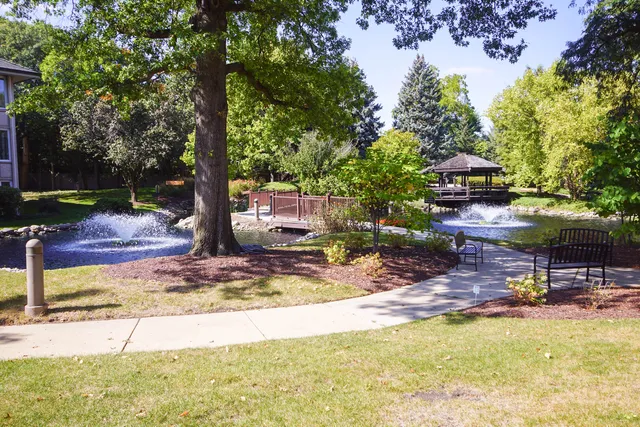 a view of a lake with a yard