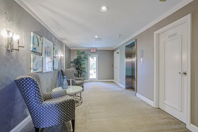 a view of livingroom with hardwood floor and hallway