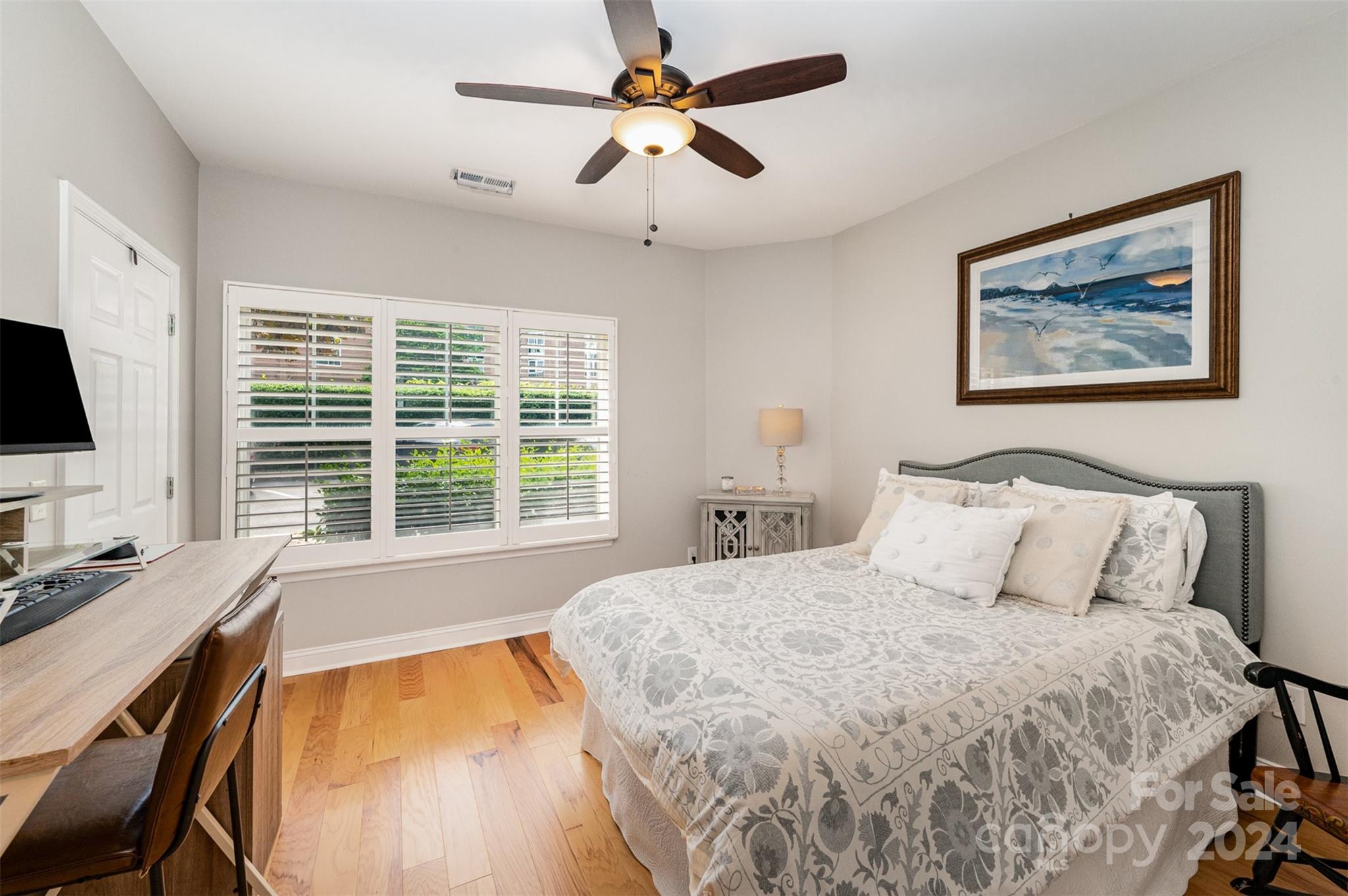 5730 Closeburn Road, Unit G Charlotte, NC 28210 - Photo 20 of 30 a bedroom with a bed and a flat screen tv