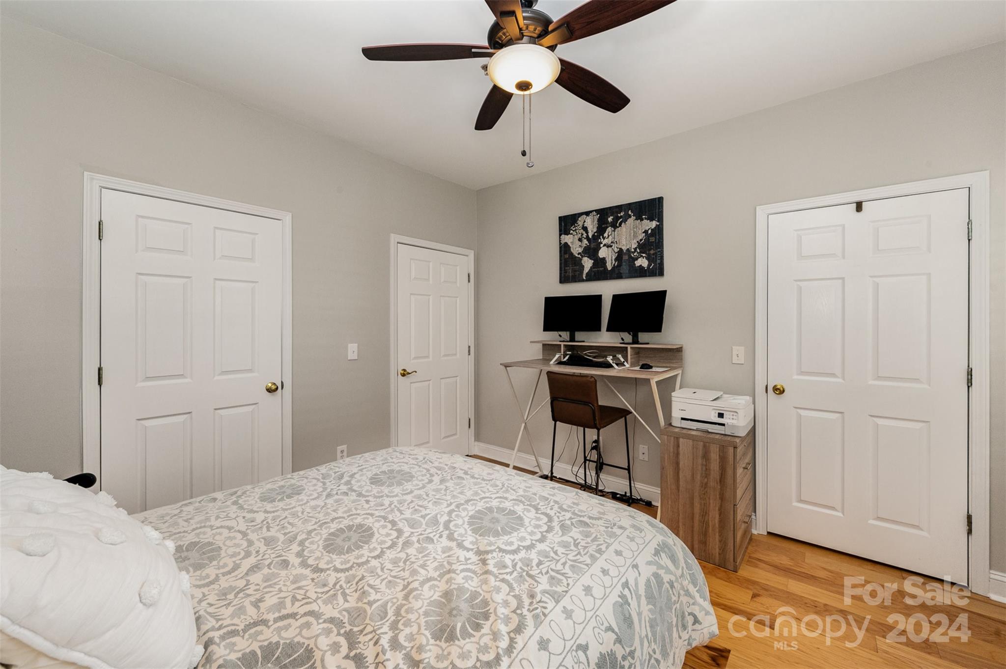 5730 Closeburn Road, Unit G Charlotte, NC 28210 - Photo 22 of 30 a bedroom with a bed and a tv on the dresser