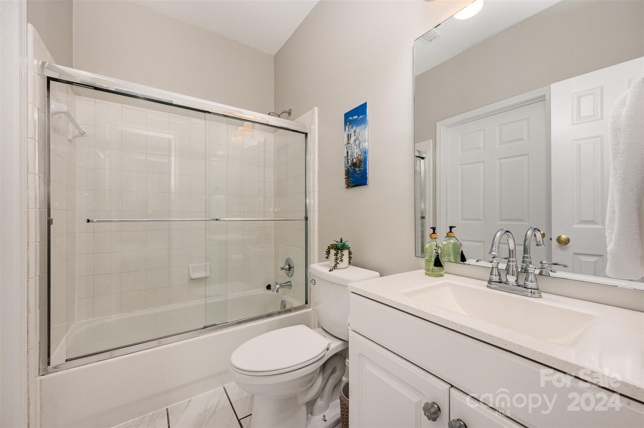 5730 Closeburn Road, Unit G Charlotte, NC 28210 - Photo 24 of 30 a bathroom with a sink toilet and shower