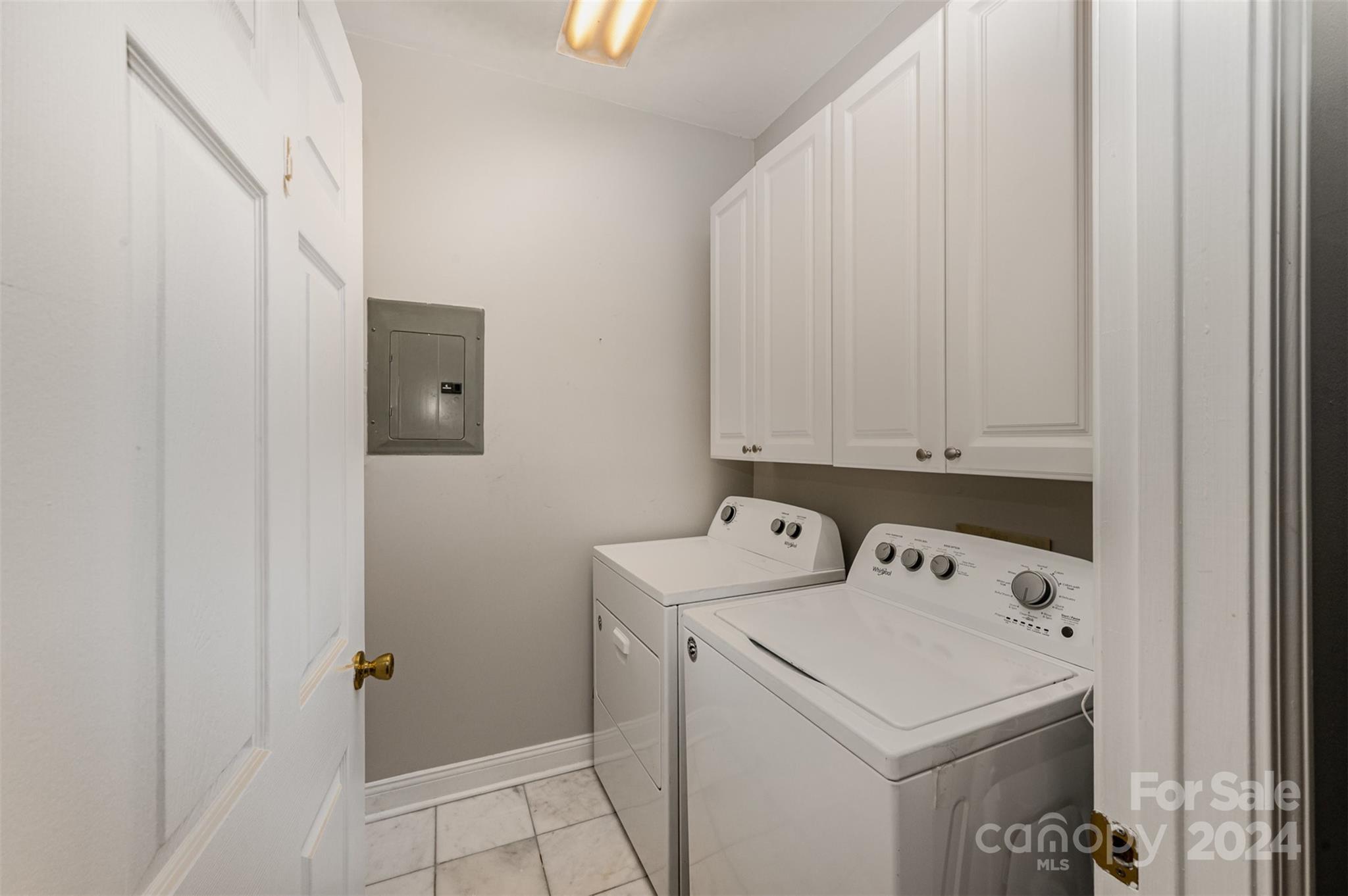 5730 Closeburn Road, Unit G Charlotte, NC 28210 - Photo 25 of 30 a utility room with dryer and washer