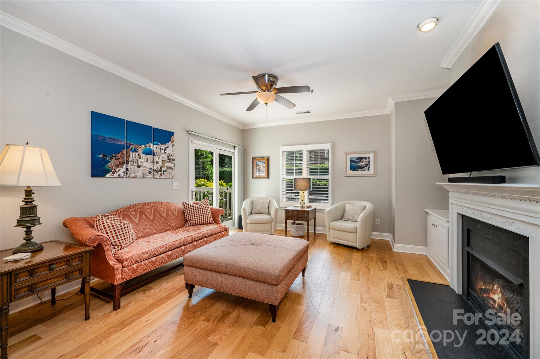 5730 Closeburn Road, Unit G Charlotte, NC 28210 - Photo 8 of 30 a living room with furniture fireplace and flat screen tv