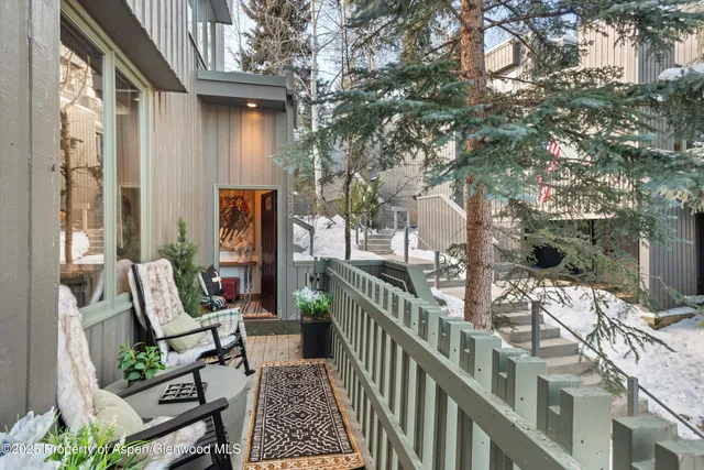 a view of balcony with furniture and outdoor seating