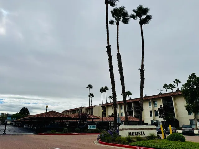 a view of a swimming pool with a chairs