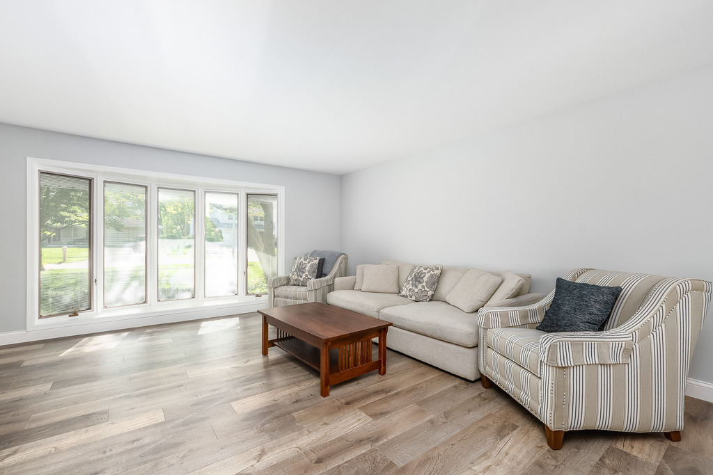 1570 Burning Trail Wheaton, IL 60189 - Photo 11 of 30 a living room with furniture and a large window
