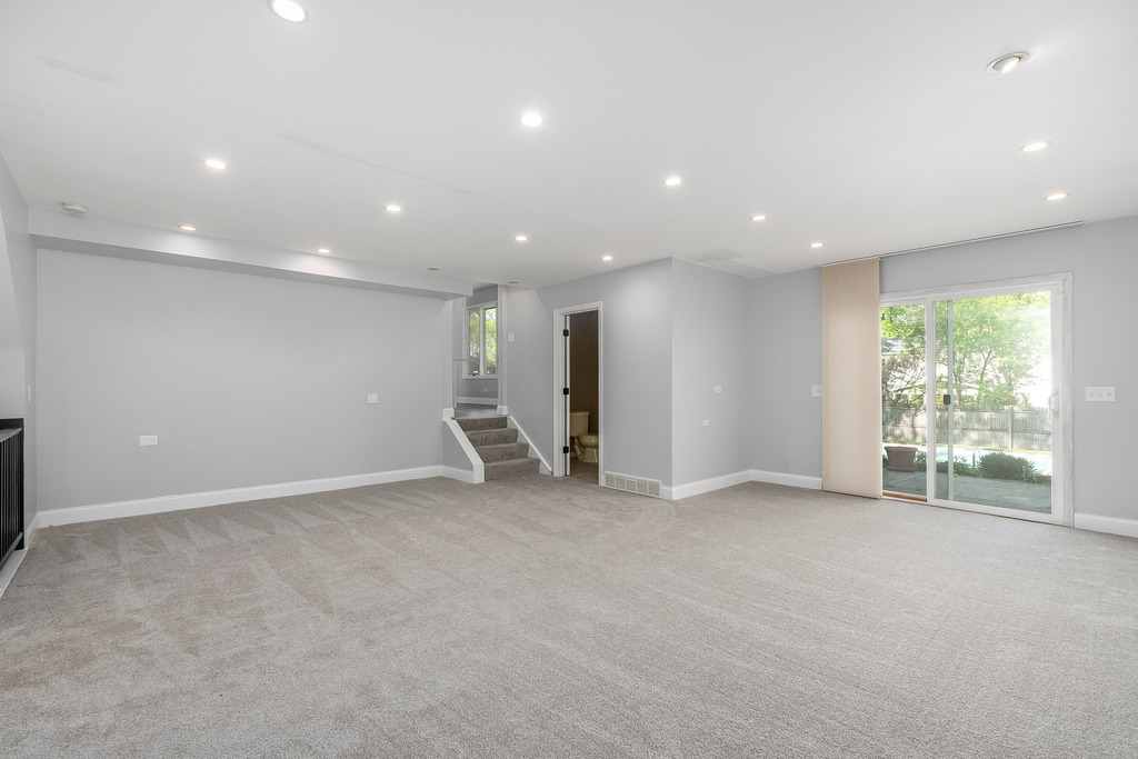 1570 Burning Trail Wheaton, IL 60189 - Photo 17 of 30 an empty room with large windows