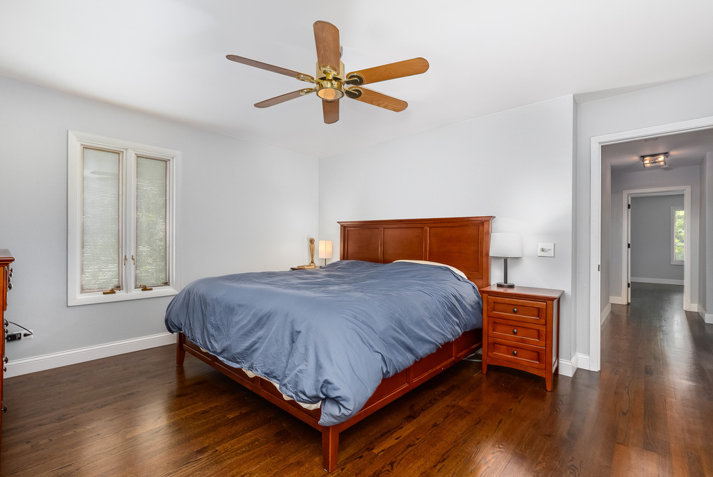1570 Burning Trail Wheaton, IL 60189 - Photo 18 of 30 a bedroom with a bed and wooden floor