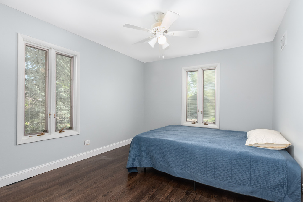 1570 Burning Trail Wheaton, IL 60189 - Photo 20 of 30 a bedroom with a bed and window