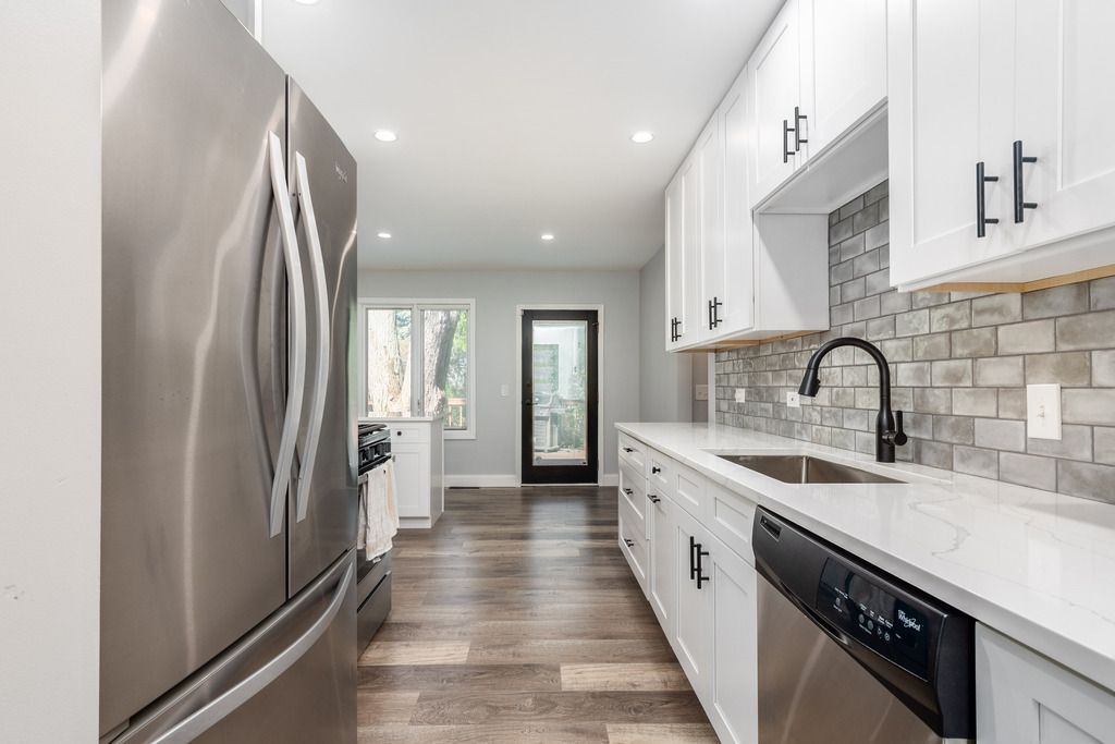 1570 Burning Trail Wheaton, IL 60189 - Photo 5 of 30 a large kitchen with stainless steel appliances