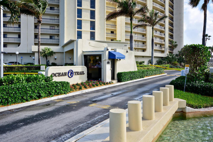 200 Ocean Trail Way, Unit 1105 Jupiter, FL 33477 - Photo 14 of 35 a front view of a building with garden