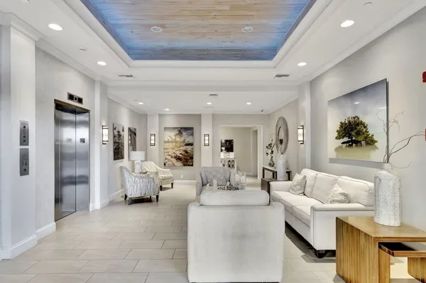 a living room with furniture and a table