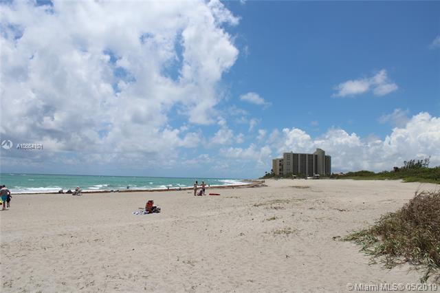 200 Ocean Trail Way, Unit 1105 Jupiter, FL 33477 - Photo 19 of 35 a view of a beach with a city view