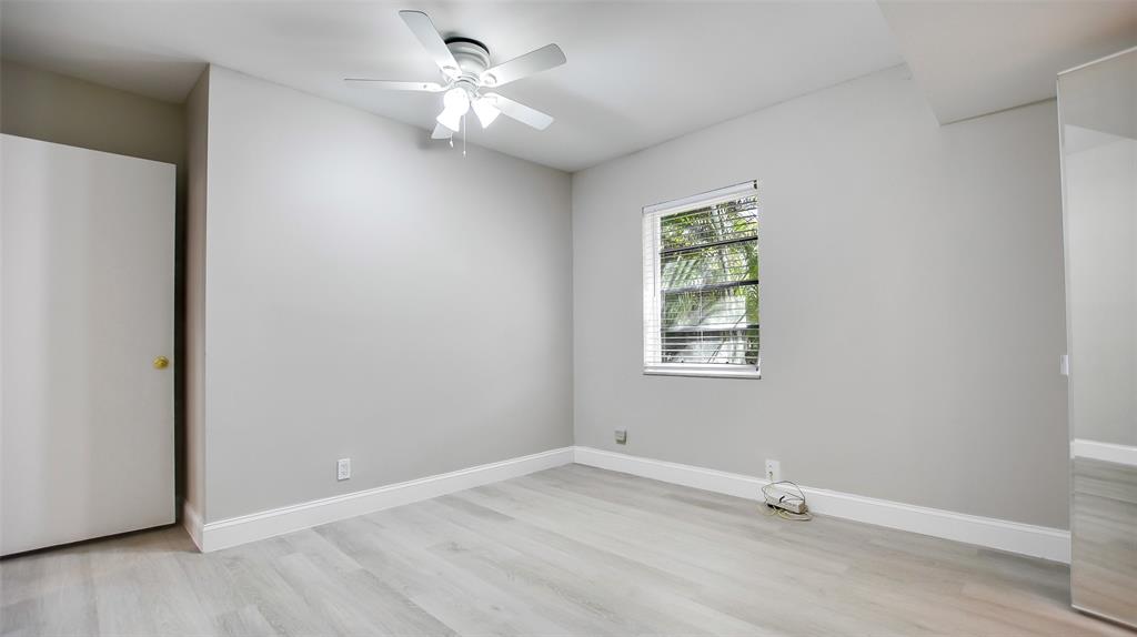 600 Southwest 19th Street Fort Lauderdale, FL 33315 - Photo 11 of 24 an empty room with a window and a fan