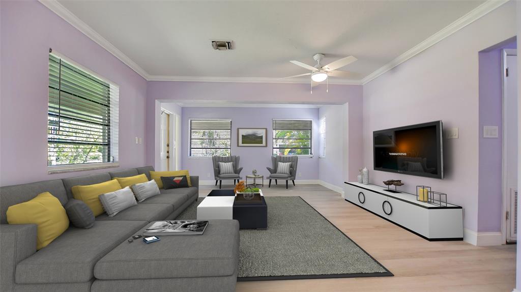 600 Southwest 19th Street Fort Lauderdale, FL 33315 - Photo 3 of 24 a living room with furniture and a flat screen tv