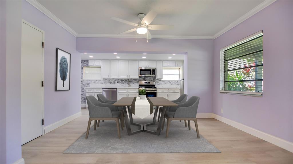 600 Southwest 19th Street Fort Lauderdale, FL 33315 - Photo 4 of 24 a view of a dining room with furniture and a chandelier