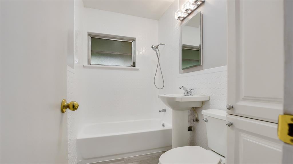 600 Southwest 19th Street Fort Lauderdale, FL 33315 - Photo 10 of 24 a bathroom with a sink a toilet and shower