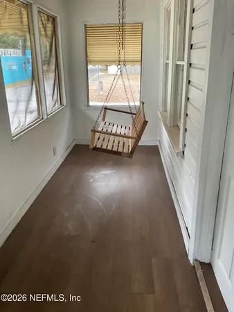 an empty room with windows