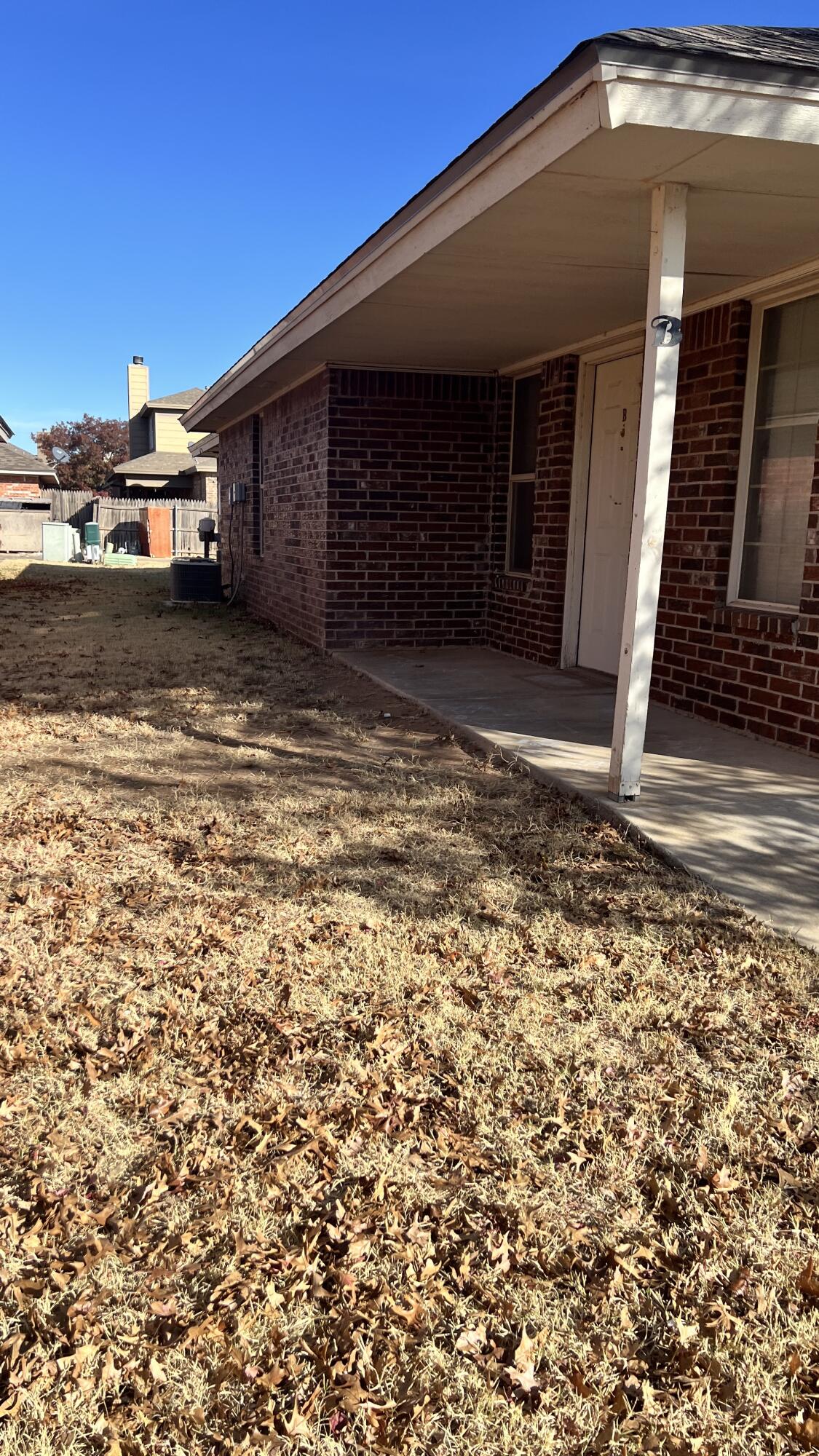3102 110th Street, Unit B Lubbock, TX 79423 - Photo 2 of 8 a view of a car garage