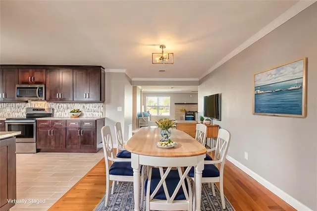 a view of a dining room with furniture