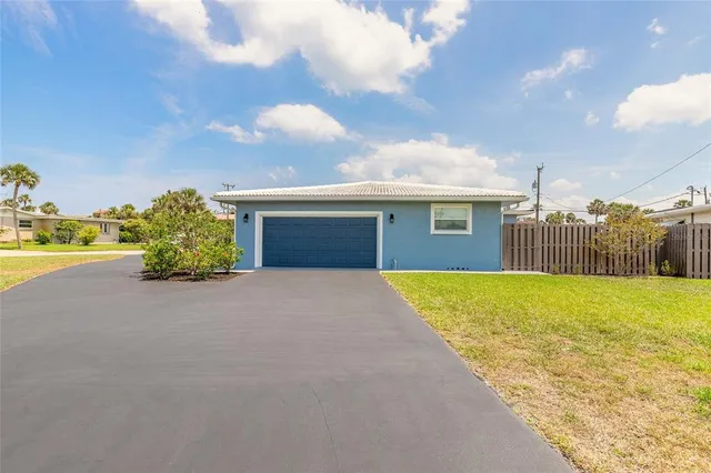 a front view of a house having yard