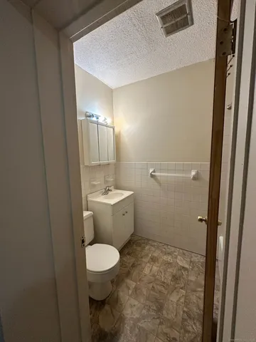 a bathroom with a shower and a bath tub