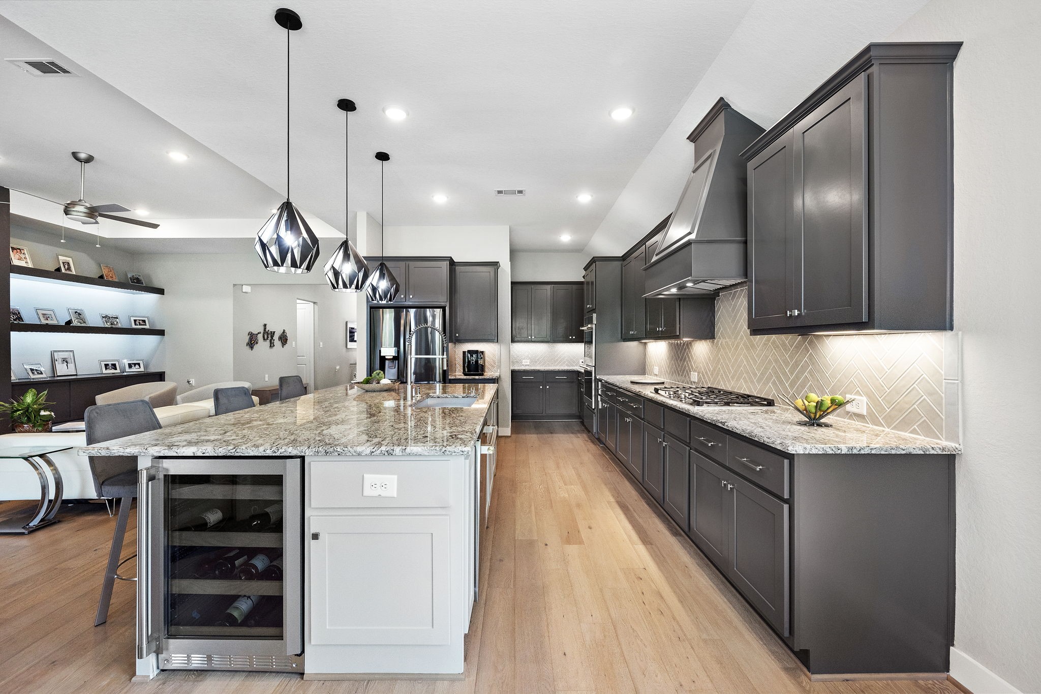 7551 Congress Trl Way Porter, TX 77365 - Photo 13 of 49 Of course, a wine fridge to complete the kitchen.