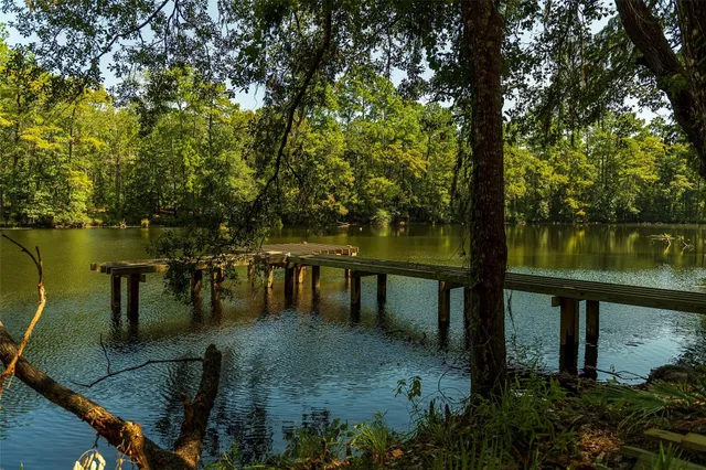 a lake view with a bench