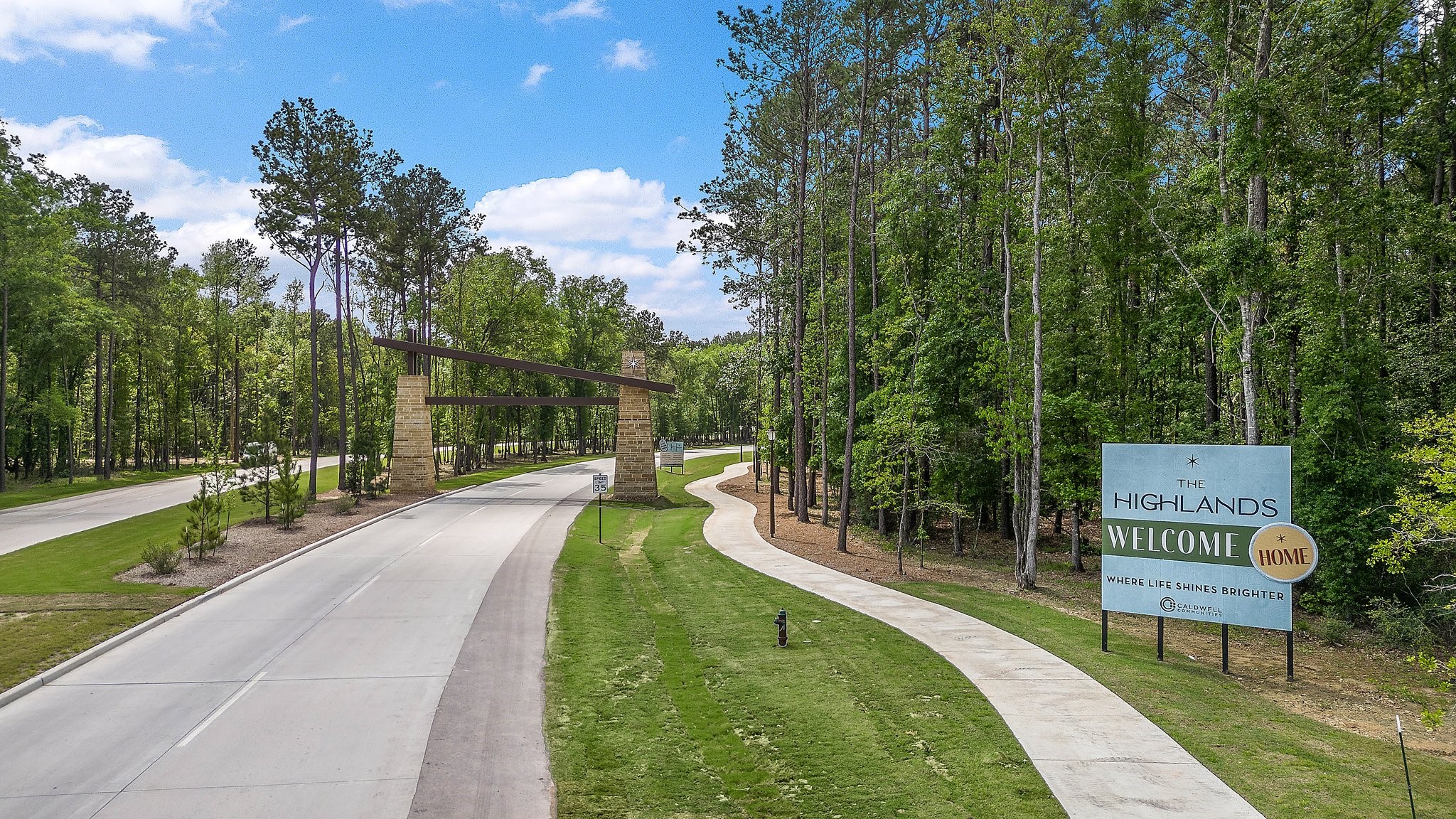 7551 Congress Trl Way Porter, TX 77365 - Photo 47 of 49 The grand entrance to The Highlands, your next home awaits.