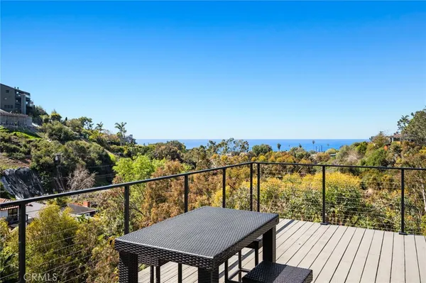a view of a balcony with mountain view