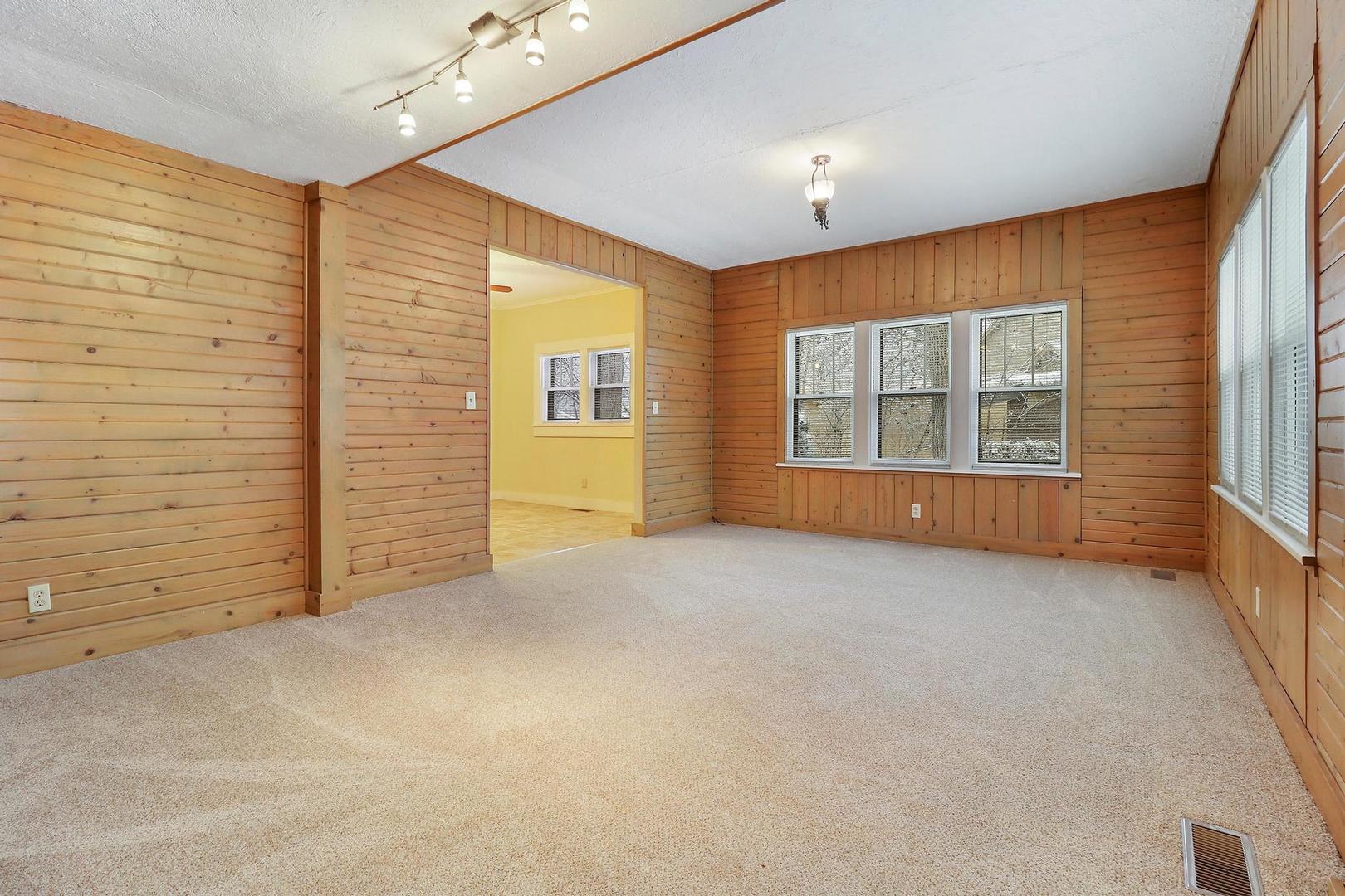 7608 Beverly Way Spring Grove, IL 60081 - Photo 10 of 25 a view of an empty room with a window