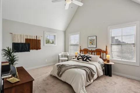 a view of a livingroom with a car window and wooden floor