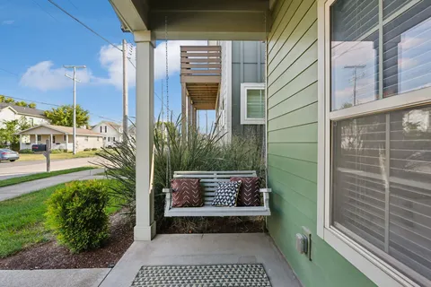 a view of front door of house and porch