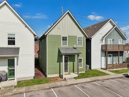 a house with garden in front of it