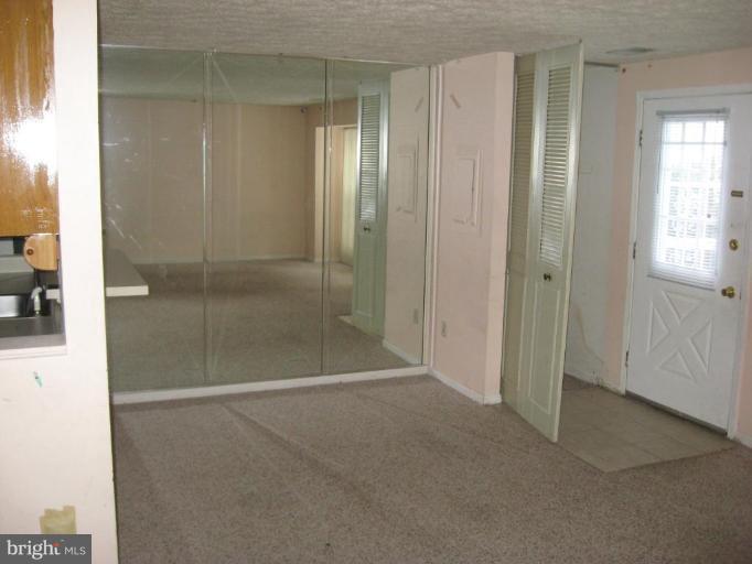 11232 Legato Way Silver Spring, MD 20901 - Photo 8 of 12 Mirrored Wall in Living Room