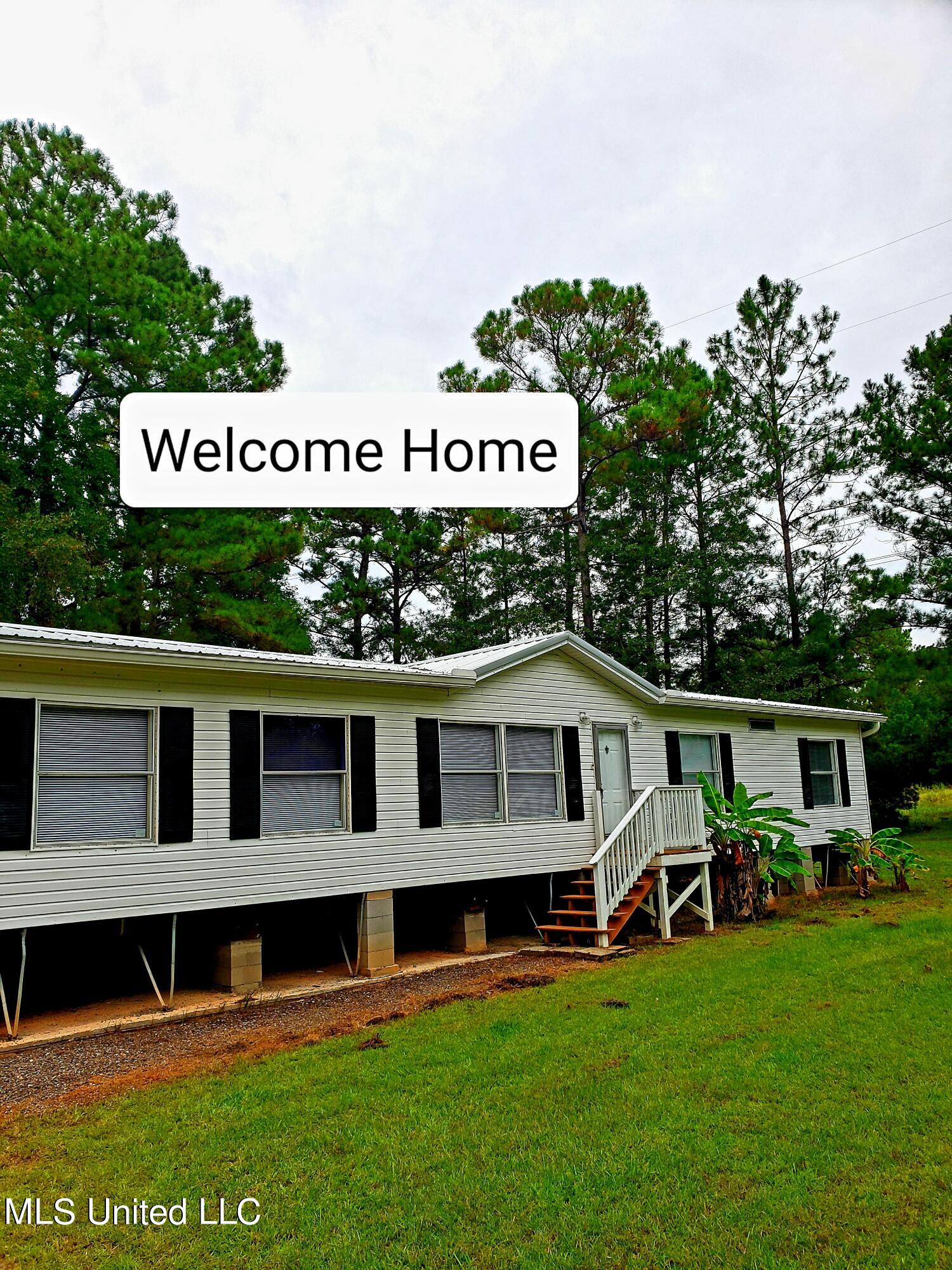 14513 McGregor Road Vancleave, MS 39565 - Photo 1 of 38 Welcome Home Front