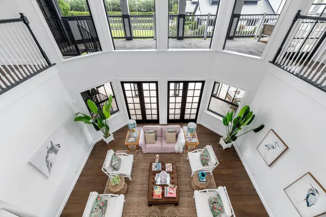 a bedroom with two beds and a window