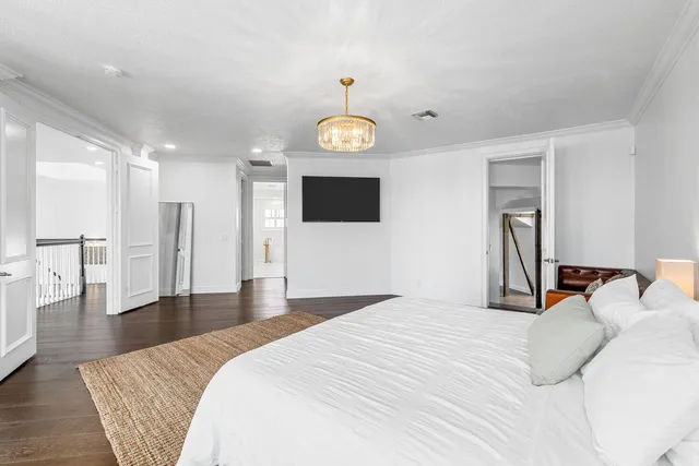 a bathroom with a toilet a sink and shower