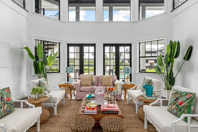 a view of a dining room with furniture wooden floor and chandelier