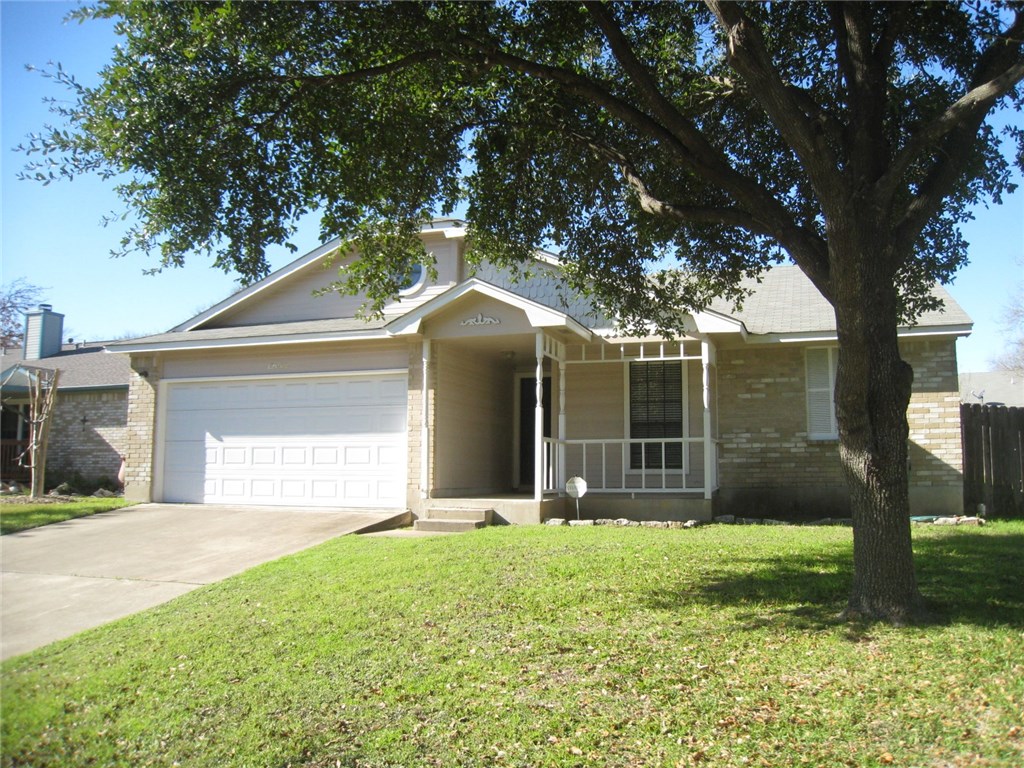 12008 Snow Goose Road Austin, TX 78758 - Photo 1 of 1 a front view of a house with garden