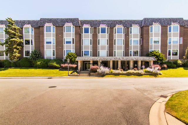 2400 Archbury Lane, Unit 2H Park Ridge, IL 60068 - Photo 1 of 26 a view of swimming pool with outdoor seating and yard