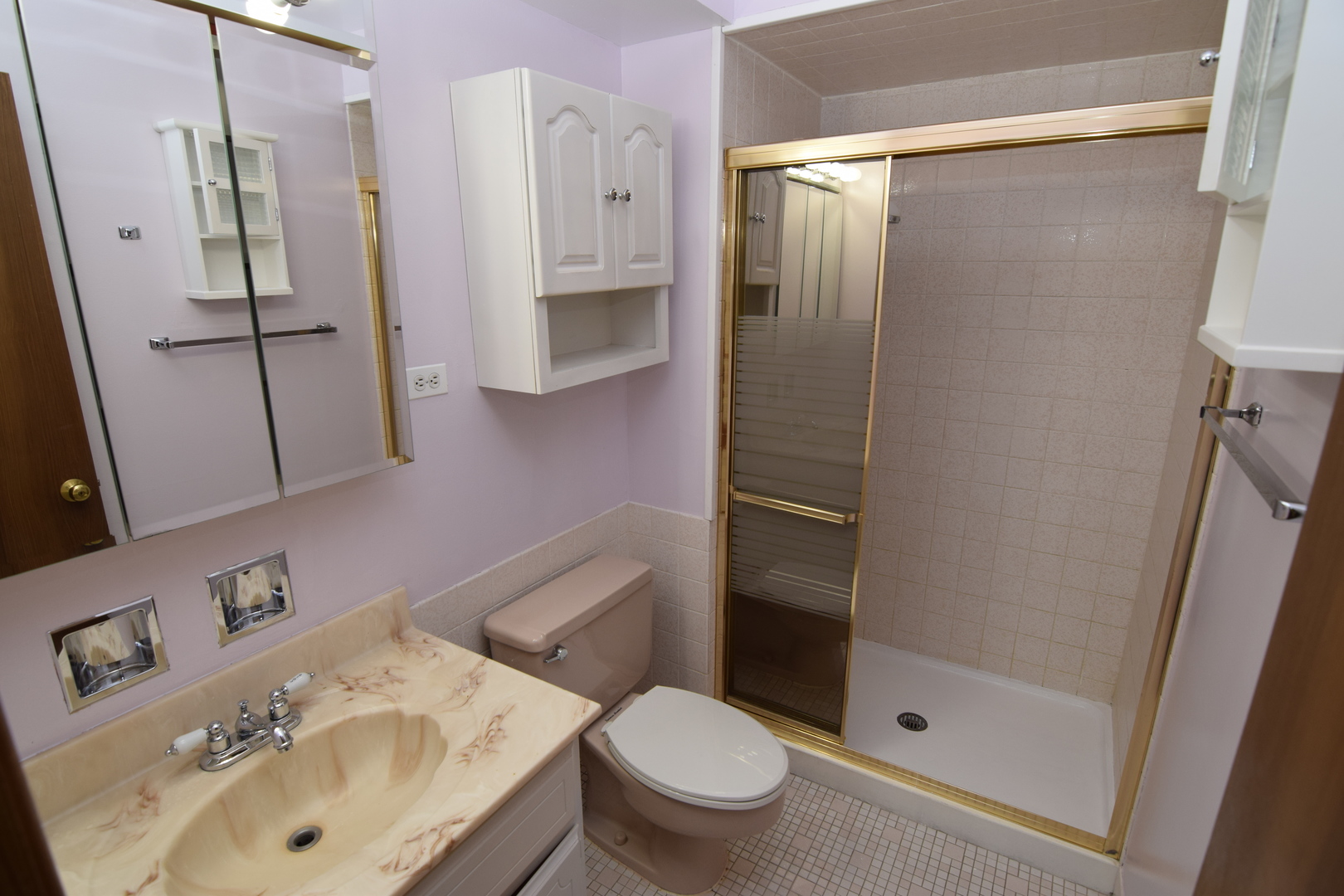 2400 Archbury Lane, Unit 2H Park Ridge, IL 60068 - Photo 12 of 26 a bathroom with a sink toilet and shower