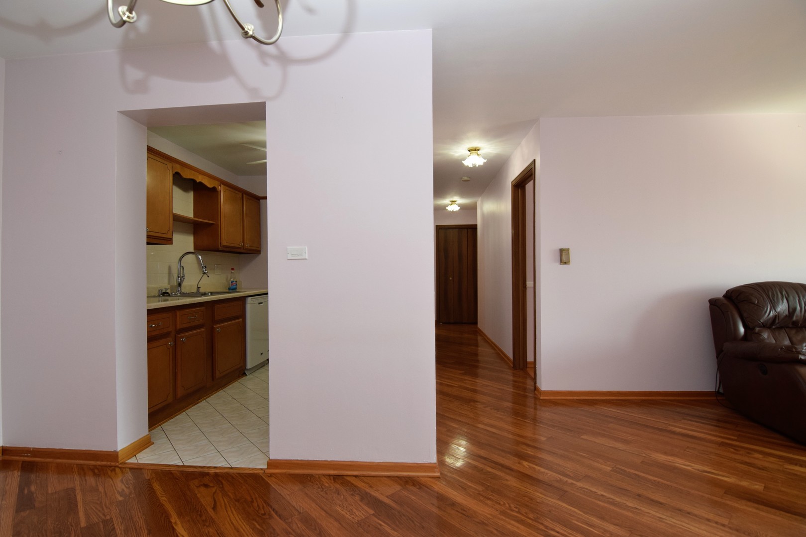 2400 Archbury Lane, Unit 2H Park Ridge, IL 60068 - Photo 4 of 26 a view of a kitchen from the hallway