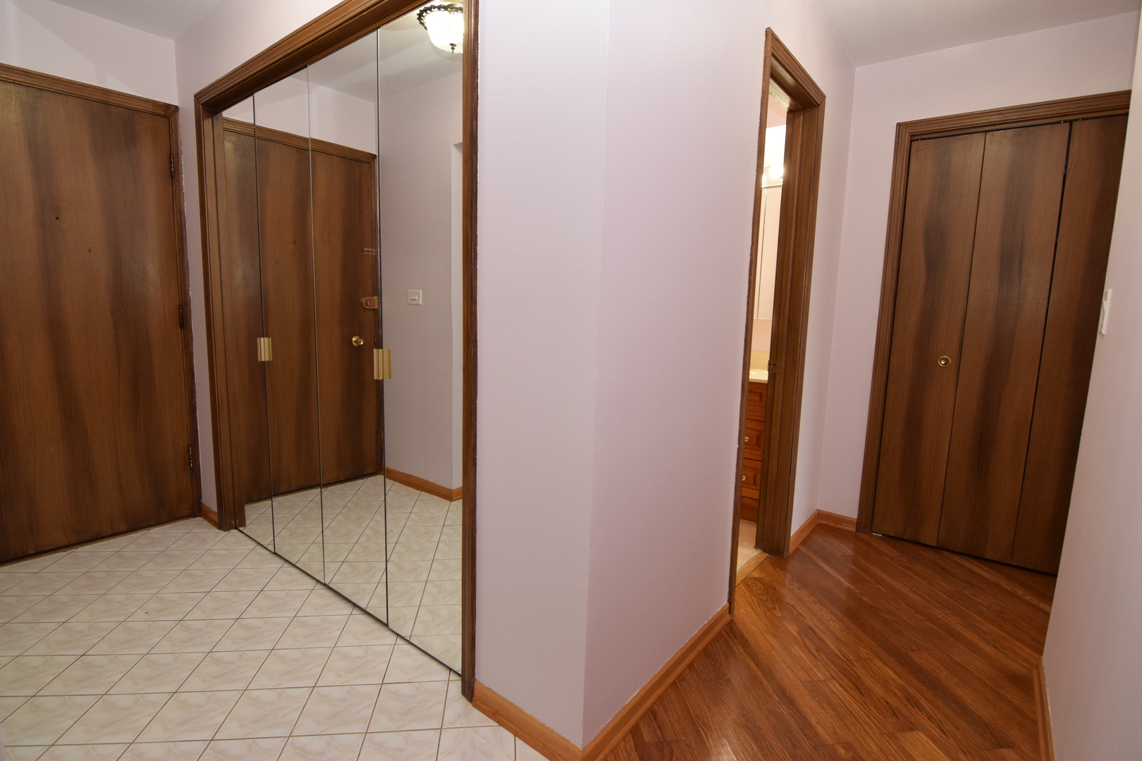 2400 Archbury Lane, Unit 2H Park Ridge, IL 60068 - Photo 9 of 26 a view of hallway with wooden floor